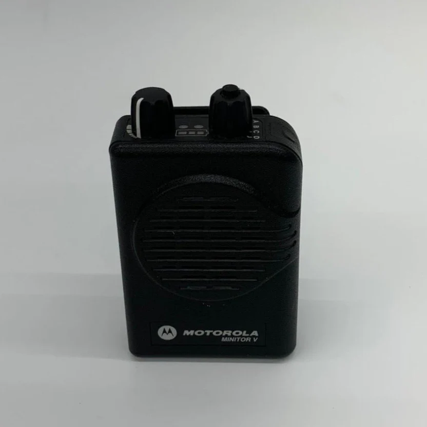 Do you have any used Motorola UHF pagers with voice storage that can receive 476.2875 MHZ?